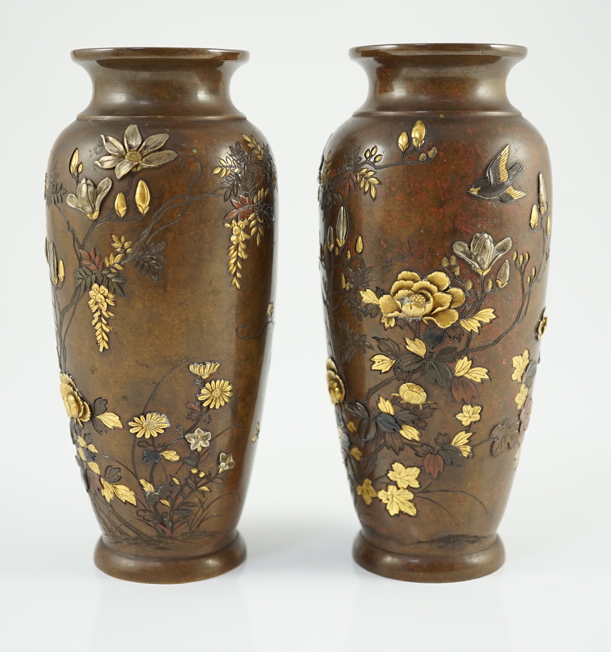 A pair of Japanese mixed metal bronze vases, by Nogawa workshop, Meiji period, 15cm high